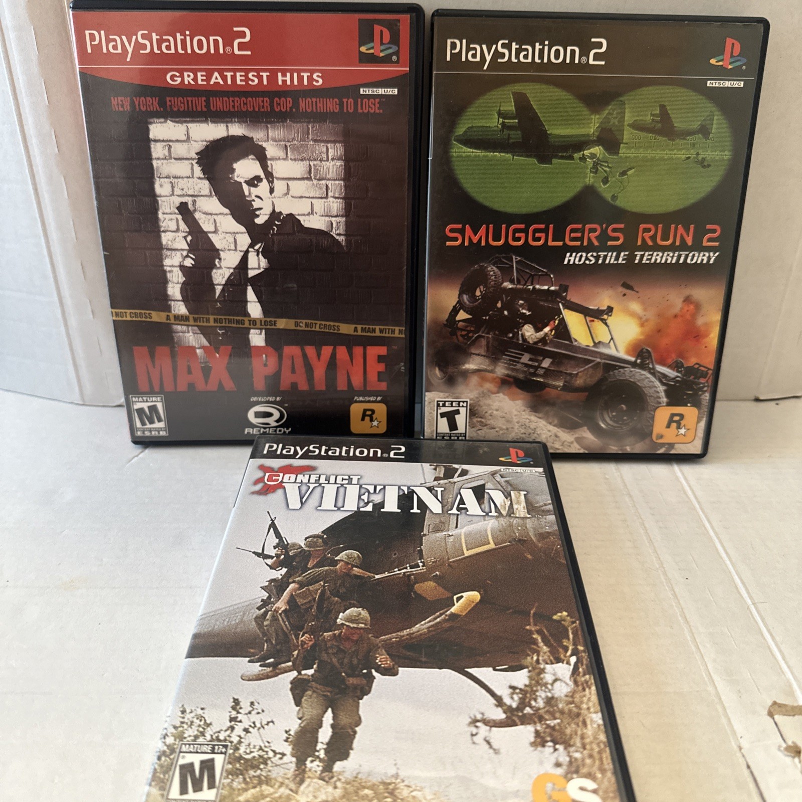 Lot Of 3 PS2 Smugglers Run 2, Max Payne , Conflict Vietnam W/manuals Not Tested
