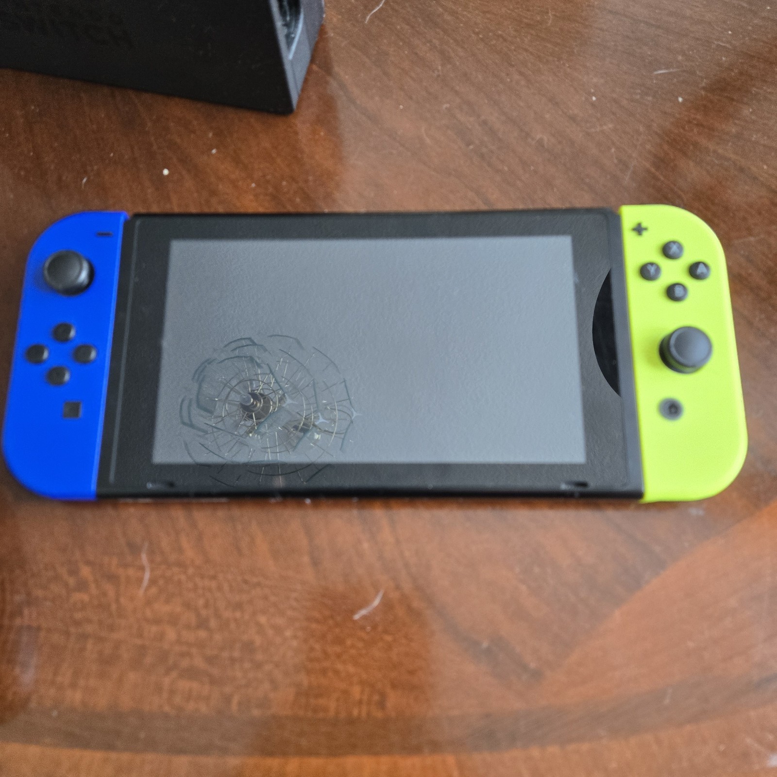 Nintendo Switch w/ Blue/Yellow Joy-Cons, Extra Joy-Cons, Accs And An SD Card