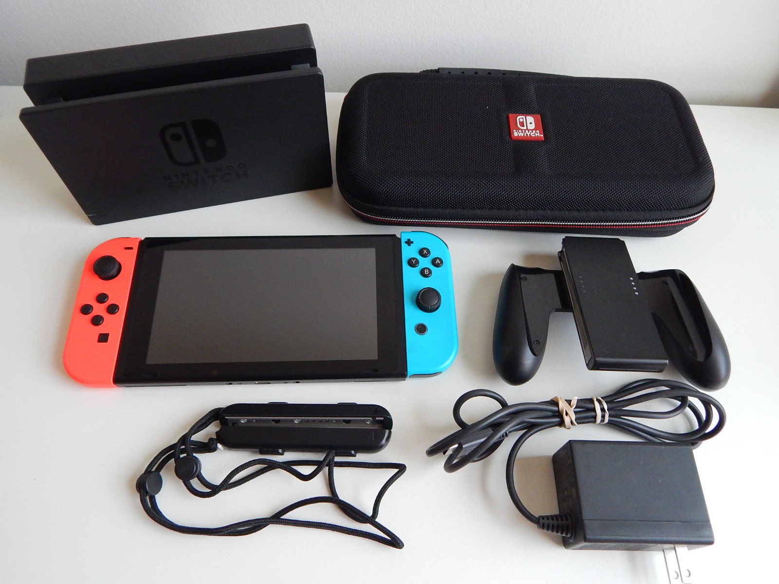 Nintendo Switch 32GB System Console Neon Red & Blue Joy‑Cons, Dock & Case