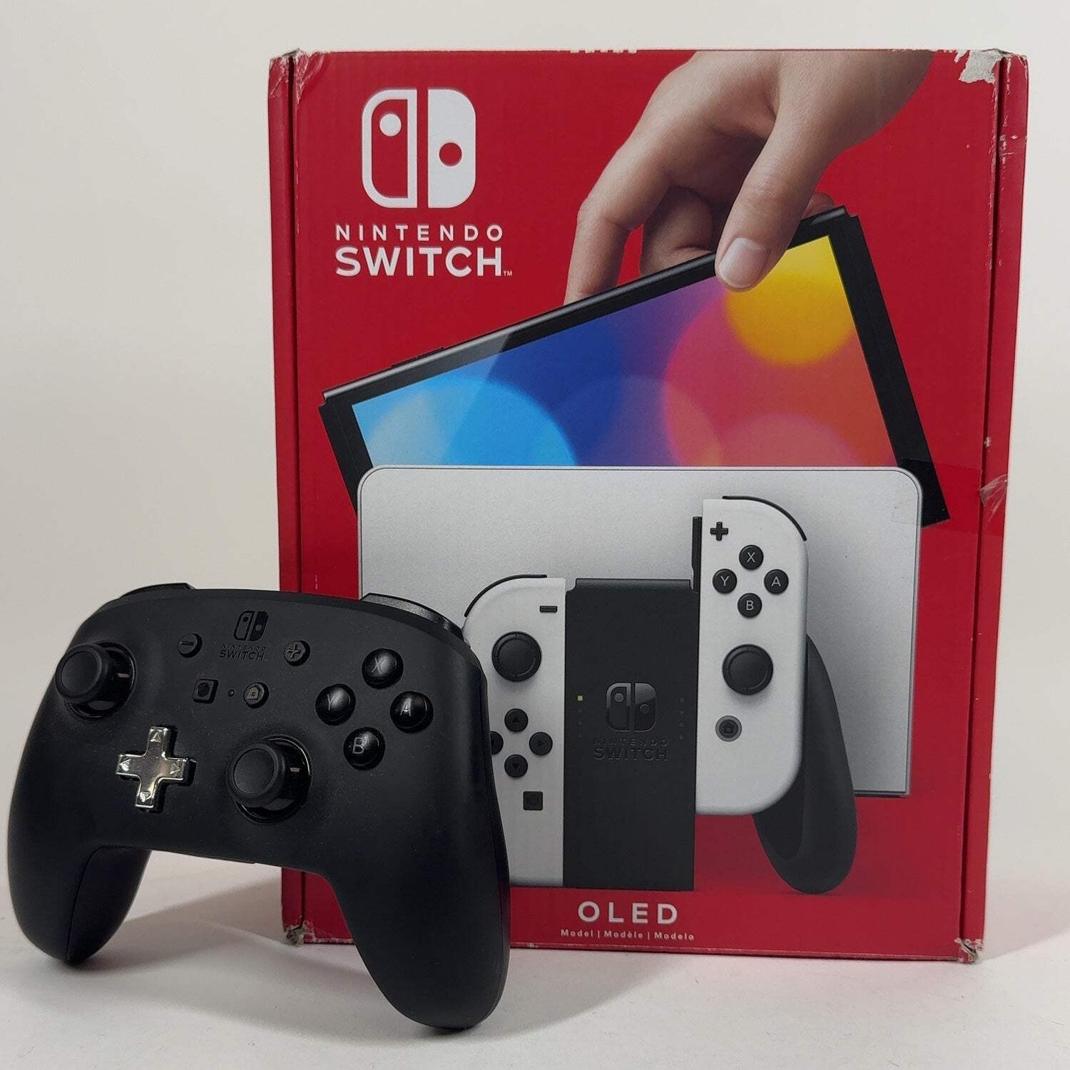 Nintendo Switch (OLED Model) – White Joy-Con (box art shows OLED white set)